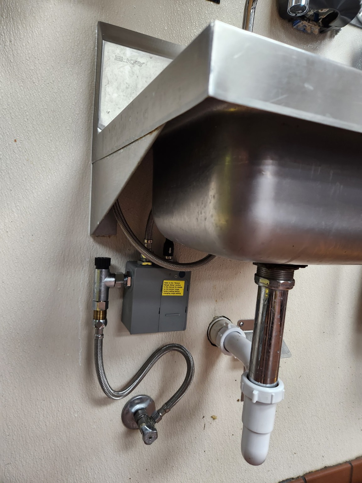 Commercial hand sink plumbing installation