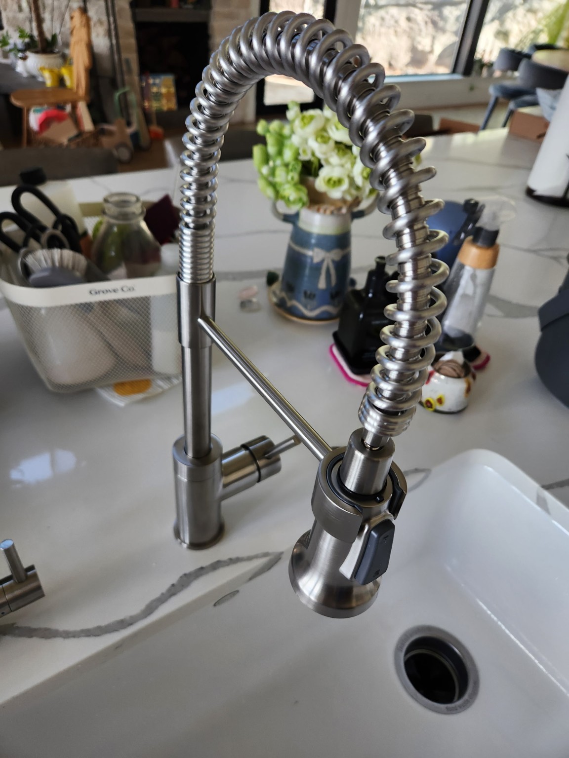 New spring-style kitchen faucet installation