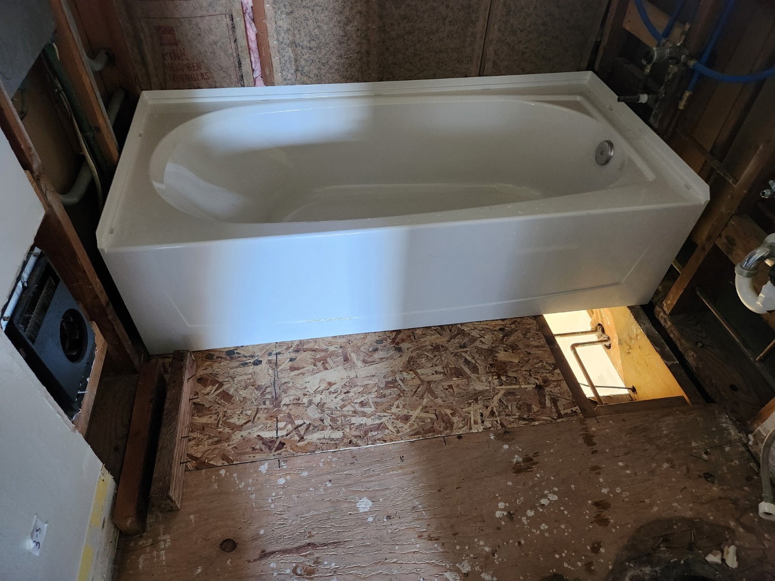 New bathtub installed during a bathroom remodel